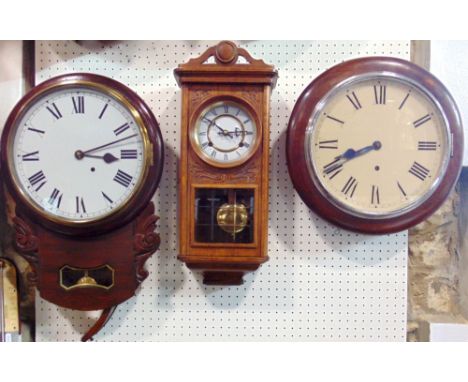 A collection of wall timepieces to include a single train drop dial wall clock, a further single train wall clock, a drop dia