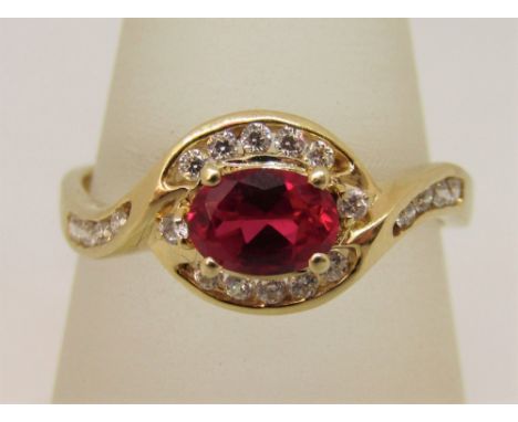 14ct ruby and cubic zirconia crossover dress ring, size T, 3.6g