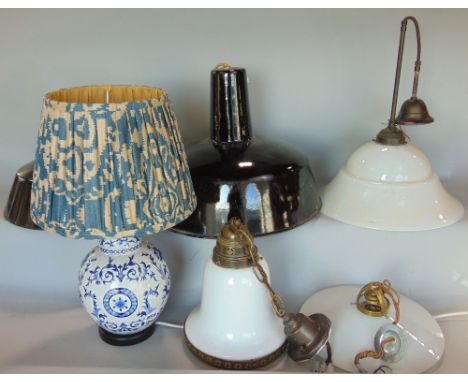 A collection of vintage and other electrical light fittings including two graduated black enamelled shades of circular form, 