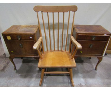 A pair of bedside cupboards in the Queen Anne style with fall fronts and frieze drawers on shaped supports, a narrow oak hall