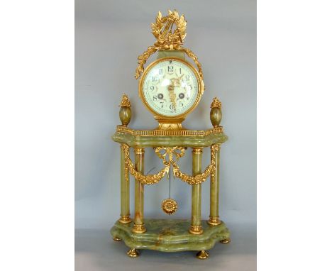 French gilt metal and agate portico type mantel clock, the twin train drum head movement with Arabic numerals and fancy paint