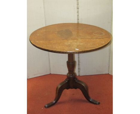 A Georgian oak snaptop table, 73cm diameter top raised on a vase shaped pillar and tripod base, together with a square cut Ge