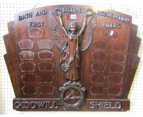 An early 20th century mahogany panel, 'Bath &amp; District Association First Aiders,' the central angelic figure holding laur