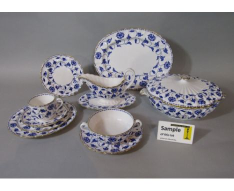 A collection of Spode Blue Colonel pattern wares comprising a pair of tureens and covers, an oval serving plate, a sauce boat