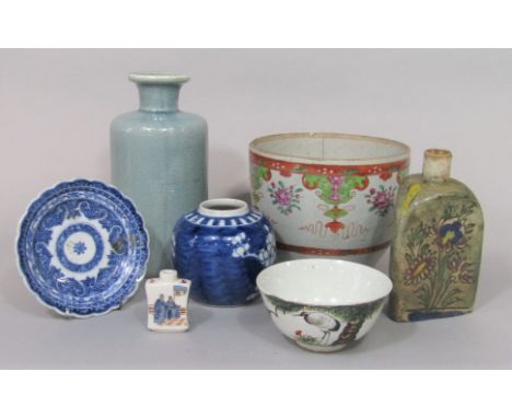 A collection of oriental ceramics including a 19th century blue and white dish, a scent bottle with figure decoration and pai