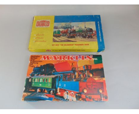 Boxed train set Hornby Dublo set 2023 'The Caledonian' by Meccano, including City of London 4-6-2 locomotive, two rail electr
