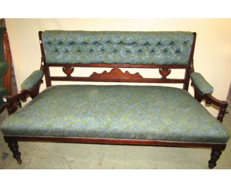 An Edwardian parlour room sofa with carved and moulded show wood frame with string banded inlay, marquetry detail and raised 