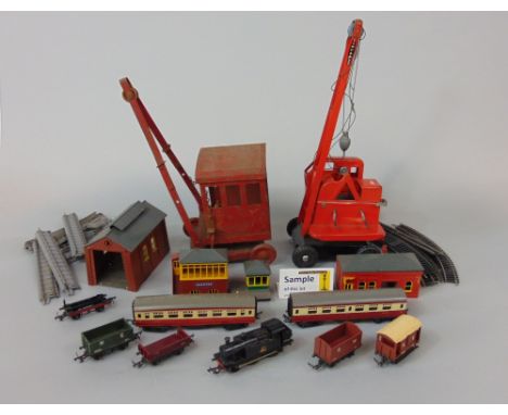 Collection of model toys, mostly Tri-ang including a Jones KL44 crane, railway track, carriages, one engine together with a f