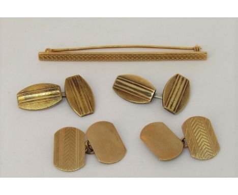 14k tie pin together with a pair of 9ct cufflinks and a further gold plated 800 silver pair; all with engine turned decoratio