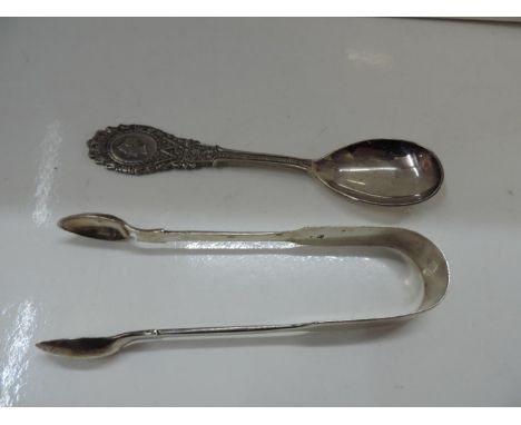 Pair of Silver Sugar Nips and a Continental Silver Spoon 