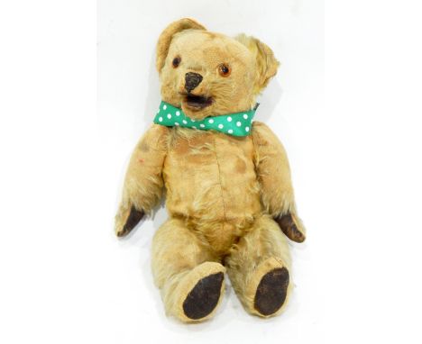 A vintage mohair bear with open mouth mechanism, having button lever at the back, 36cm long 