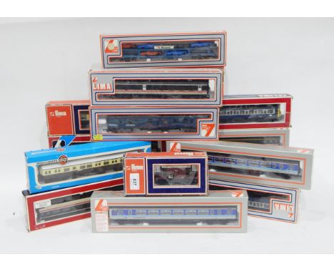 A selection of Lima model carriages, including restaurant car, super sprinter, intercity, parcels express, an Airfix railway 