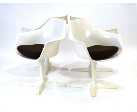 Maurice Burke for Arkana, a set of four Model 116 white fibreglass armchairs on four-star swivel bases*Sold subject to our So