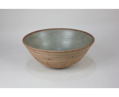A Bernard Leach studio pottery bowl with green glazed interior, circular impressed seal mark to base, 24cm diameter