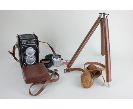 A Franke & Heidecke Braunschweig Rolleicord camera in leather case, with two Franke & Heidecke lenses, and leather cased fold