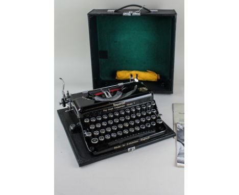 An Imperial typewriter, The Good Companion Model T, with instruction booklet, in carry case