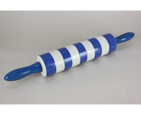 A T.G Green & Co Cornishware pottery rolling pin with wooden handles, 46cm