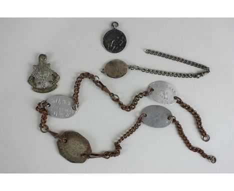 Four First World War tags on metal chain, to Pte J Norman 51428 9th Machine Gun Squadron, together with a tag to AAF Officer 