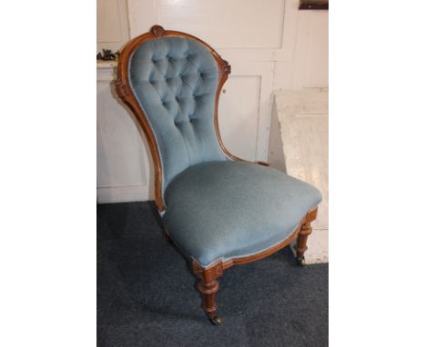 A Victorian button back upholstered chair