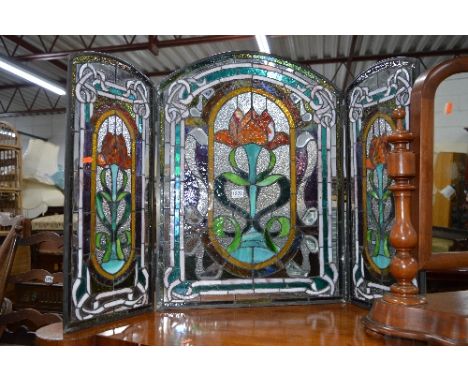 THREE FOLD FIRE SCREEN, with lead glazed coloured inset panels