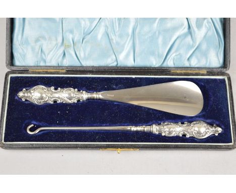 A CASED SILVER BUTTON HOOK AND SHOE HORN