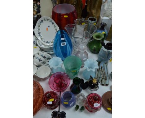 SEVENTEEN PIECES OF COLOURED GLASSWARE, including vases, jars and covers, cranberry pieces, s.d. (17)