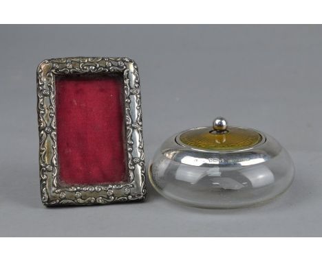 AN EARLY 20TH CENTURY SILVER PHOTOGRAPH FRAME, Birmingham 1902, Henry Matthews, approximately 8cm x 5.5cm, together with a fl