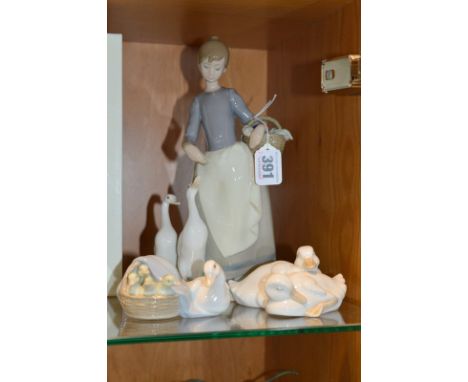A LLADRO FIGURE GROUP, 'Pacing the Ducks' No.1306, Lladro Ducklings No.4895 and Nao Ducks resting (3)