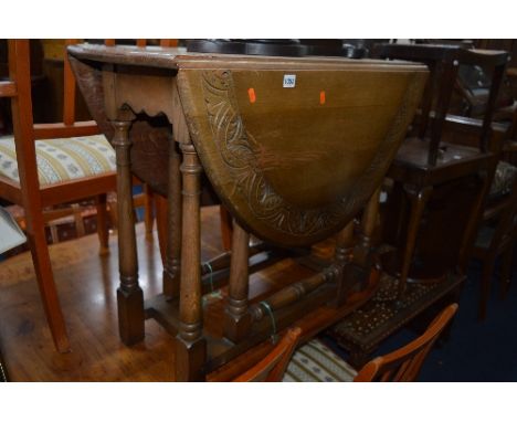 AN OAK GATE LEG TABLE and a oak barometer (sd) (2)