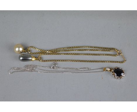 A SAPPHIRE AND DIAMOND OVAL 9CT GOLD PENDANT NECKLACE, the central sapphire measuring approximately 10mm x 7.5mm, open work w