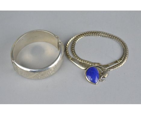 A LAPIS LAZULI SILVER NECKLACE, hallmarked Klein 925, the central irregular oval cabochon cut lapis lazuli measuring approxim