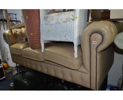 A BEIGE LEATHER CHESTERFIELD SOFA