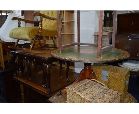 A LEATHER TOPPED ROUND YEW WOOD COFFEE TABLE, two wicker baskets, nest of three tables and an oak standard lamp (4)