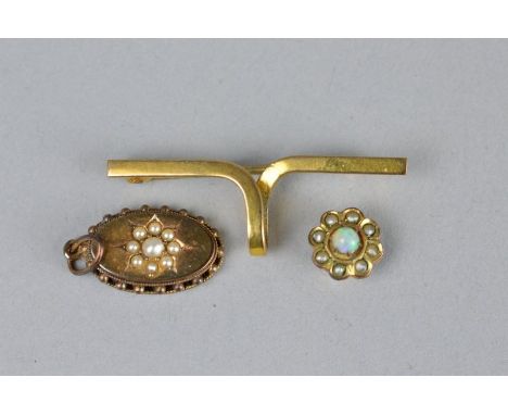 A 9CT YELLOW GOLD EARLY 20TH CENTURY BAR BROOCH, a Victorian seed pearl unmarked yellow gold pendant and an opal and seed pea