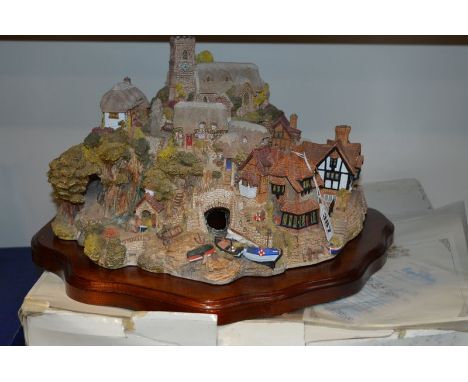A BOXED LIMITED EDITION LILLIPUT LANE SCULPTURE, 'St Peter's Cove', No 2644, with certificate, receipt of purchase and leafle