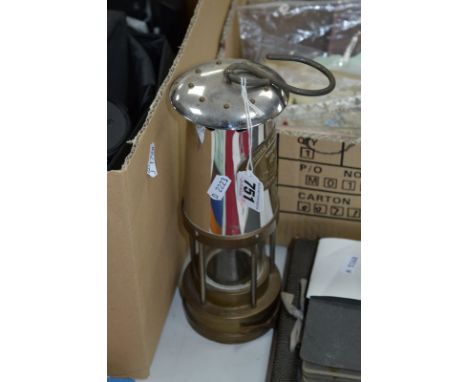 A CHROME AND BRASS MINERS LAMP