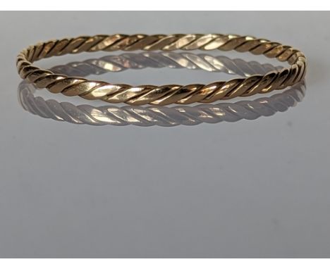 A rope-twist 9ct yellow gold bangle, 65mm, hallmarked, 18.5g