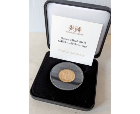 A cased Harrington & Byrne Queen Elizabeth II UK Gillick Gold Sovereign, 1962, with COA