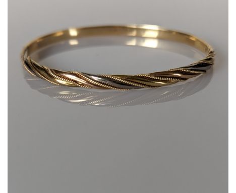 A yellow gold hinged bangle with rope twist design, 60mm, stamped 585, 14.12g