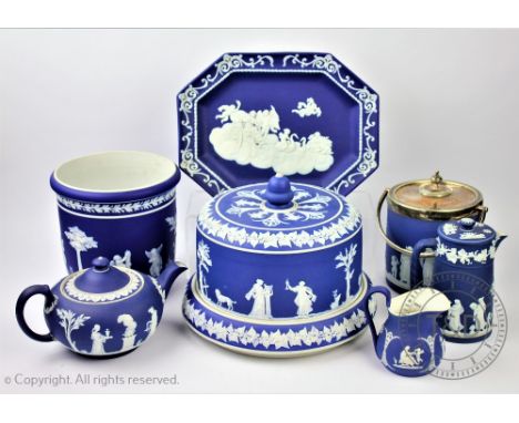 A selection of Wedgwood blue Jasperware, comprising; a canted plate decorated with an allegorical scene of a chariot, goddess