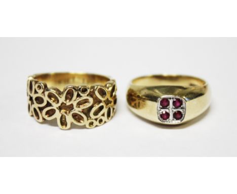 A 9ct yellow gold band, designed as stylised flower heads, weight 8gms and a ruby set 9ct gold signet ring, weight 6.1gms (2)