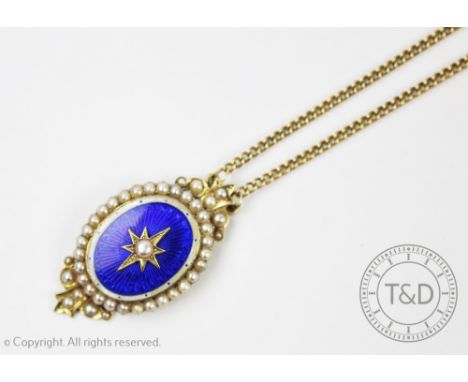 A Victorian enamel and seed pearl set pendant on later chain (a conversion) designed as an oval blue and white enamelled pane