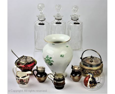 A Herend vase, decorated with green sprigs, 20.5cm, with a set of three cylindrical decanters and stoppers (one with rim chip