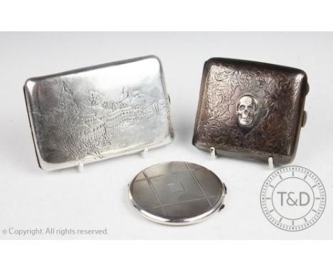 A George V silver memento mori cigarette case, William Hair Haseler, Birmingham 1920, set to the hinged cover with a skull an