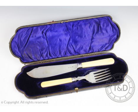 A pair of Edwardian cased silver fish servers, William Hutton &amp; Sons Ltd, London 1905, each with ivorine handles in a fit