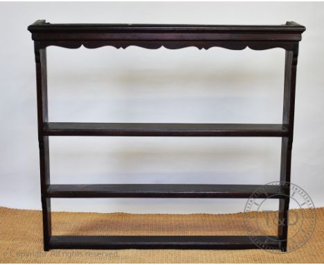 An oak wall hanging shelf rack, with three shelves, 99cm H x 110cm W