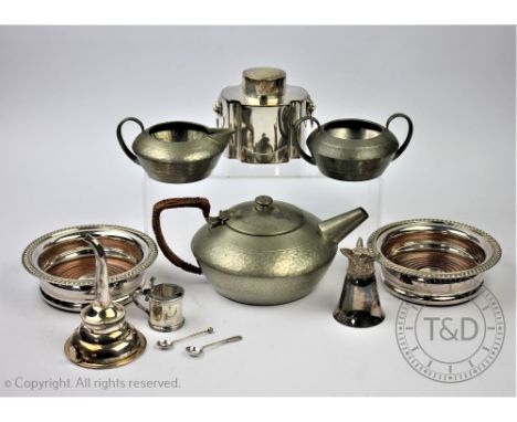 A selection of silver plated wares, comprising a pair of bottle coasters, a fox head stirrup cup, a wine funnel, a tea caddy 