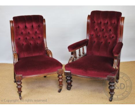 A pair of Victorian carved walnut salon chairs, with button back red upholstery, on turned legs, tallest 100cm H