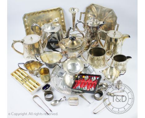 A collection of silver and silver plated items to include; a pair of silver sugar nips, two silver napkin rings, a silver pla