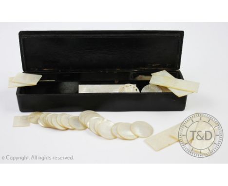 A quantity of mother of pearl and abalone shell carved counters, including circular, rectangular, fish shaped and further sha